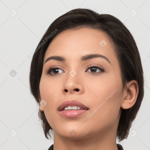 Neutral white young-adult female with medium  brown hair and brown eyes