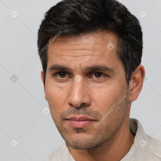 Neutral white adult male with short  brown hair and brown eyes