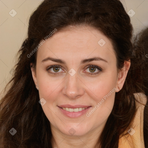 Joyful white young-adult female with long  brown hair and green eyes