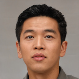 Neutral asian young-adult male with short  black hair and brown eyes