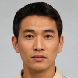 Neutral asian young-adult male with short  brown hair and brown eyes