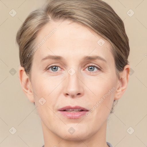 Joyful white adult female with short  brown hair and grey eyes