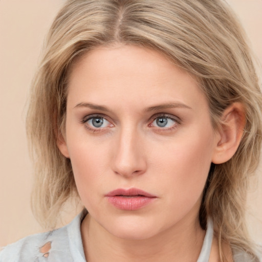 Neutral white young-adult female with medium  brown hair and blue eyes