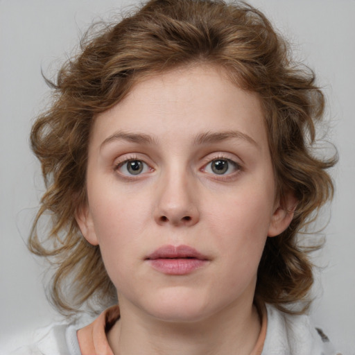 Neutral white young-adult female with medium  brown hair and blue eyes