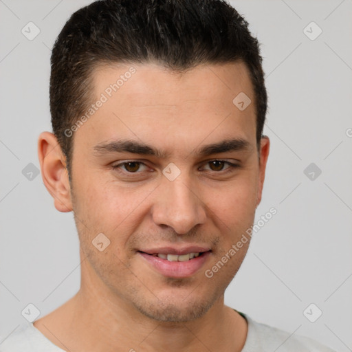 Joyful white young-adult male with short  brown hair and brown eyes