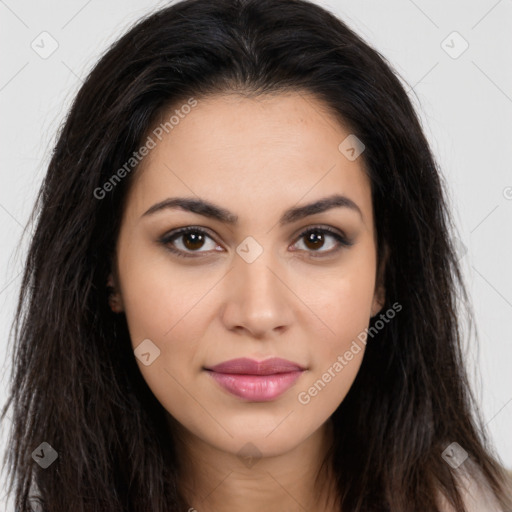 Joyful latino young-adult female with long  brown hair and brown eyes