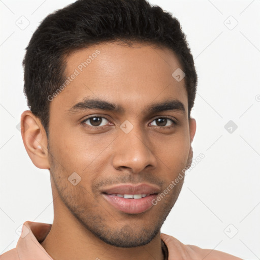 Joyful latino young-adult male with short  brown hair and brown eyes