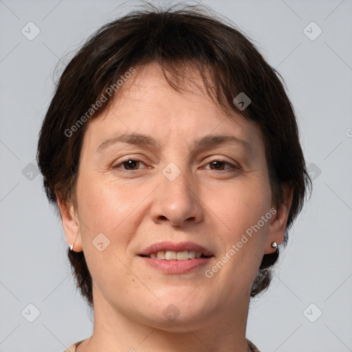 Joyful white adult female with medium  brown hair and brown eyes