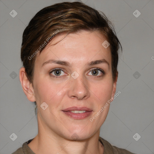 Joyful white young-adult female with short  brown hair and grey eyes