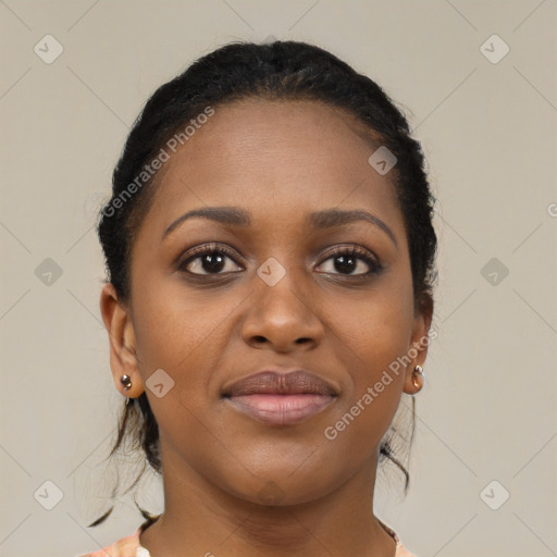 Joyful black young-adult female with medium  brown hair and brown eyes