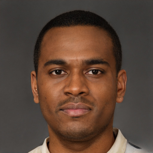 Neutral latino young-adult male with short  brown hair and brown eyes