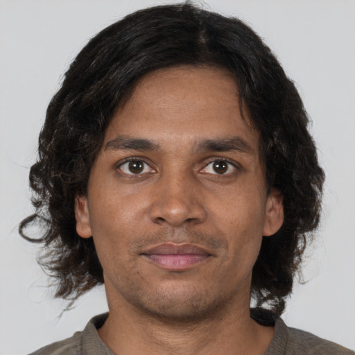 Neutral black young-adult male with short  brown hair and brown eyes