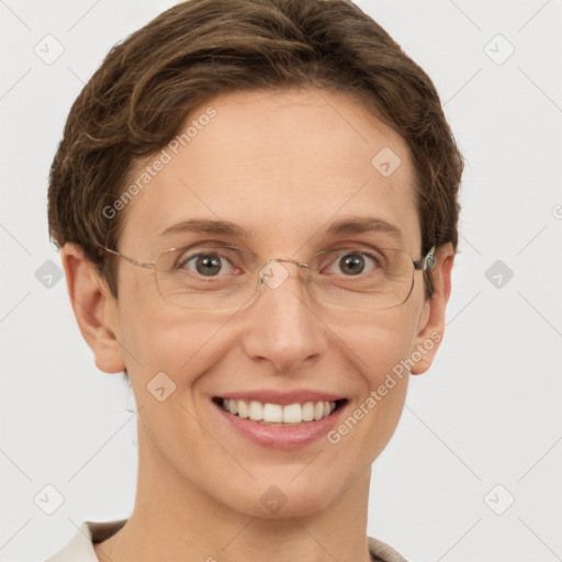 Joyful white adult female with short  brown hair and grey eyes