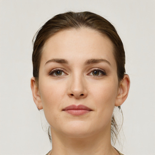 Neutral white young-adult female with short  brown hair and brown eyes