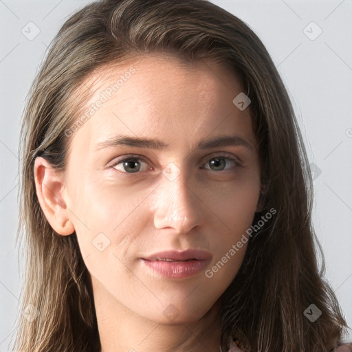 Joyful white young-adult female with long  brown hair and blue eyes