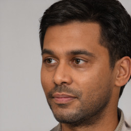 Neutral white young-adult male with short  black hair and brown eyes