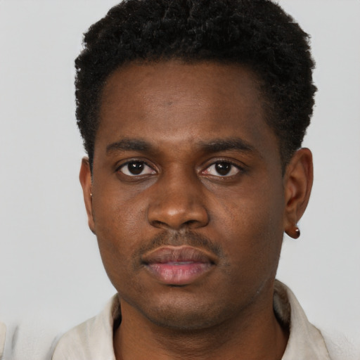 Neutral black young-adult male with short  brown hair and brown eyes