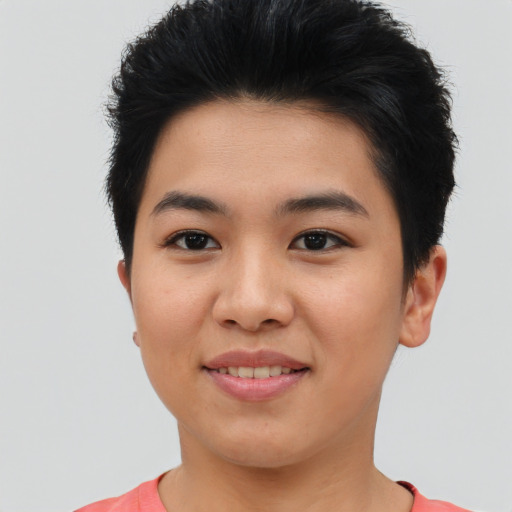 Joyful asian young-adult female with short  brown hair and brown eyes