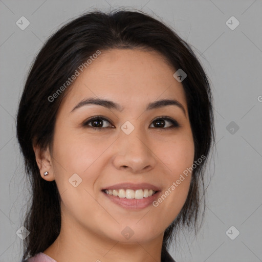 Joyful latino young-adult female with medium  brown hair and brown eyes