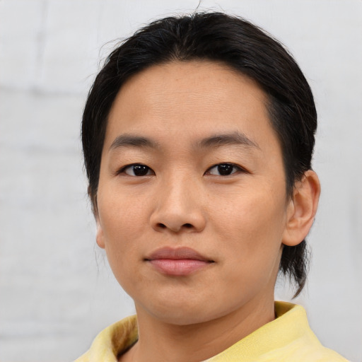 Neutral asian young-adult female with medium  brown hair and brown eyes