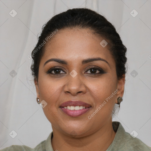 Joyful latino young-adult female with short  brown hair and brown eyes