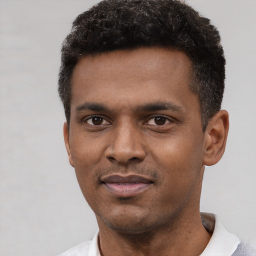 Neutral black young-adult male with short  black hair and brown eyes