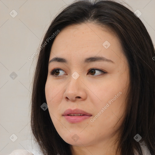 Joyful asian young-adult female with medium  brown hair and brown eyes