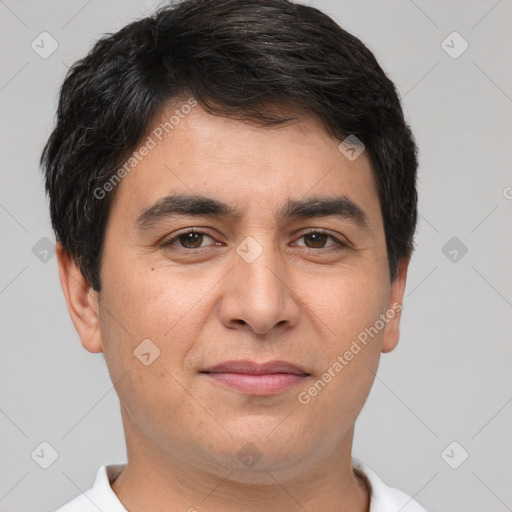 Joyful white adult male with short  brown hair and brown eyes