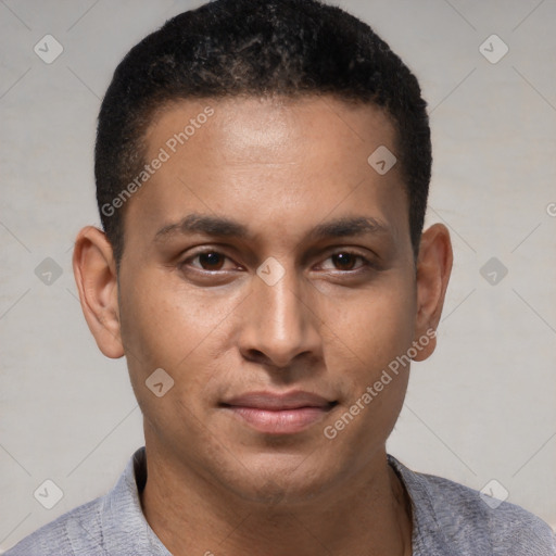 Joyful latino young-adult male with short  brown hair and brown eyes