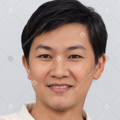 Joyful asian young-adult male with short  brown hair and brown eyes