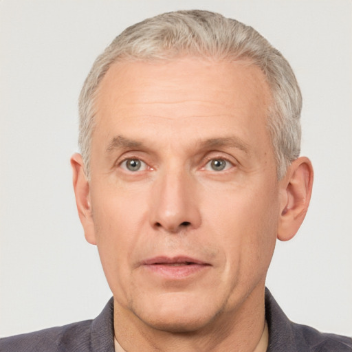 Neutral white middle-aged male with short  gray hair and grey eyes