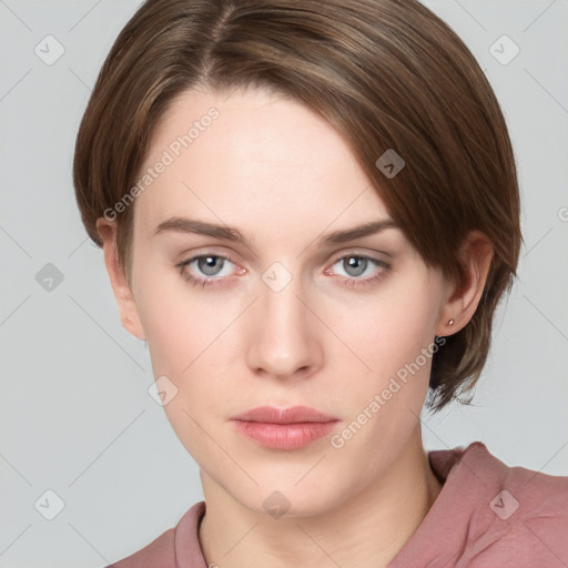 Neutral white young-adult female with medium  brown hair and grey eyes