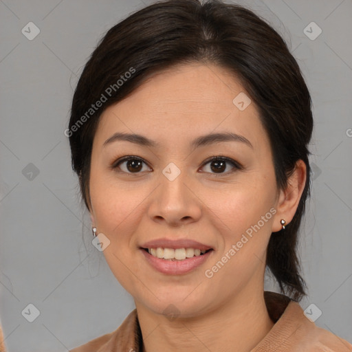 Joyful latino young-adult female with medium  brown hair and brown eyes