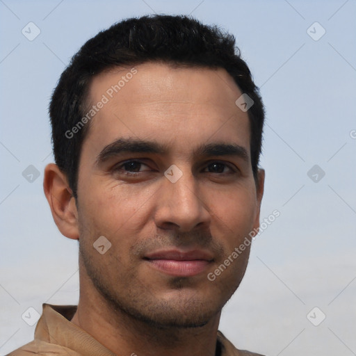 Joyful white young-adult male with short  black hair and brown eyes