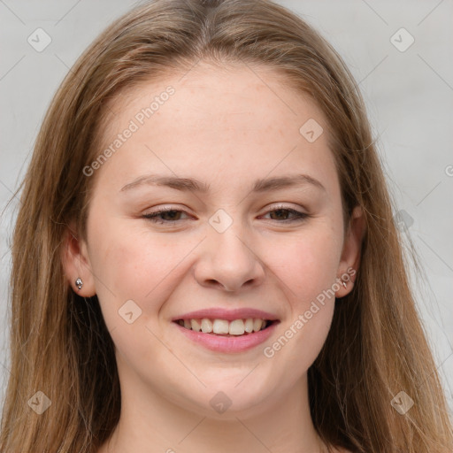 Joyful white young-adult female with long  brown hair and grey eyes