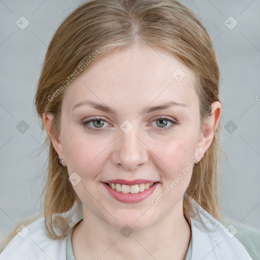 Joyful white young-adult female with medium  brown hair and blue eyes