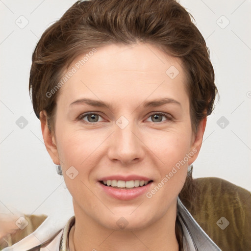 Joyful white young-adult female with short  brown hair and grey eyes