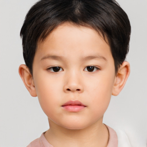 Neutral asian child male with short  brown hair and brown eyes