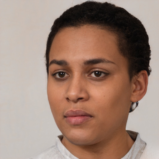 Neutral latino young-adult female with short  black hair and brown eyes