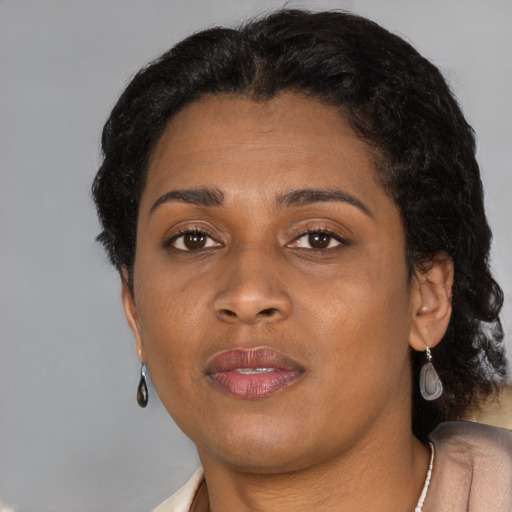 Neutral black young-adult female with short  black hair and brown eyes