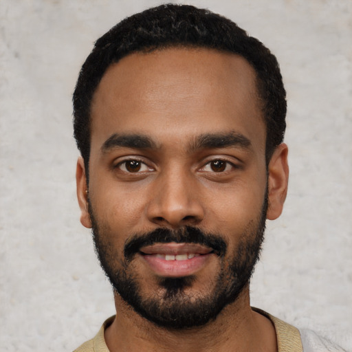 Neutral black young-adult male with short  black hair and brown eyes