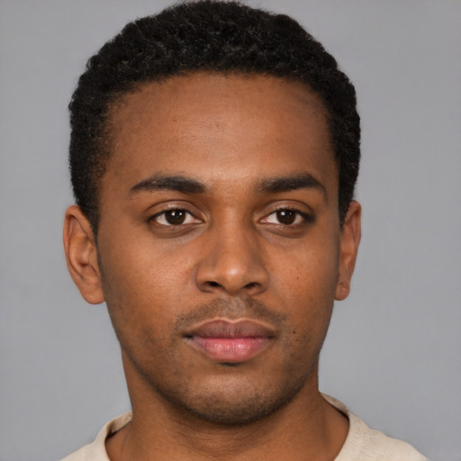 Neutral black young-adult male with short  brown hair and brown eyes