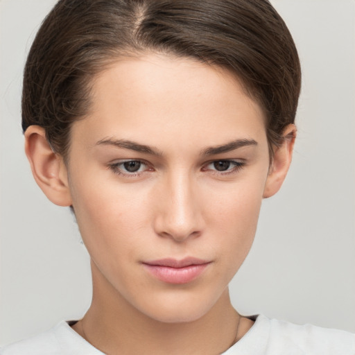 Neutral white young-adult female with short  brown hair and brown eyes