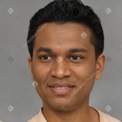 Joyful latino young-adult male with short  black hair and brown eyes