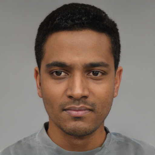 Neutral black young-adult male with short  black hair and brown eyes