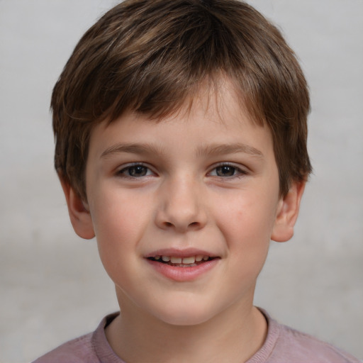 Joyful white child male with short  brown hair and brown eyes