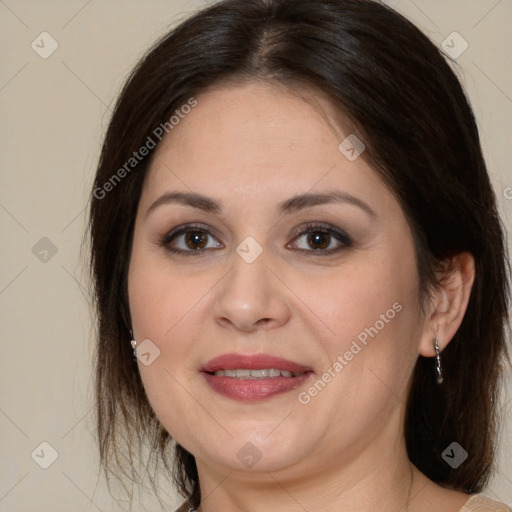 Joyful white adult female with medium  brown hair and brown eyes