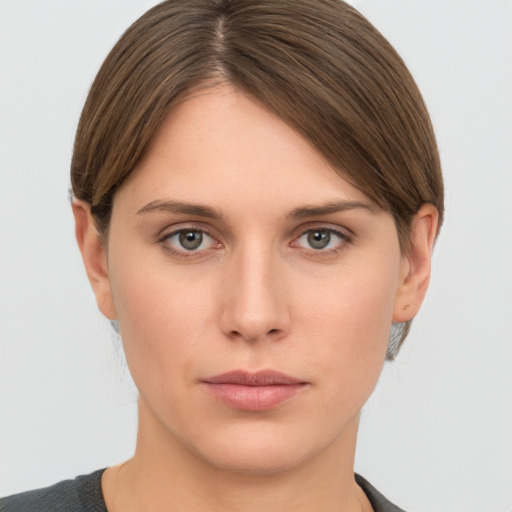 Neutral white young-adult female with short  brown hair and brown eyes