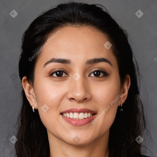 Joyful white young-adult female with long  brown hair and brown eyes