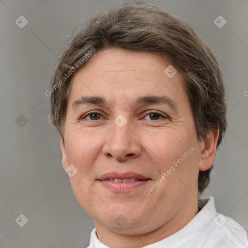 Joyful white adult female with short  brown hair and brown eyes